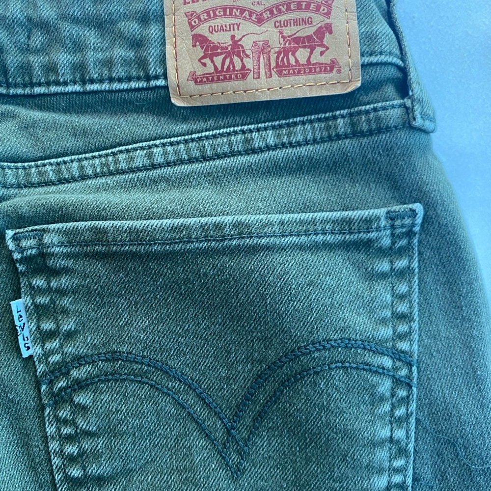 Levi’s 535 ripped jeans green